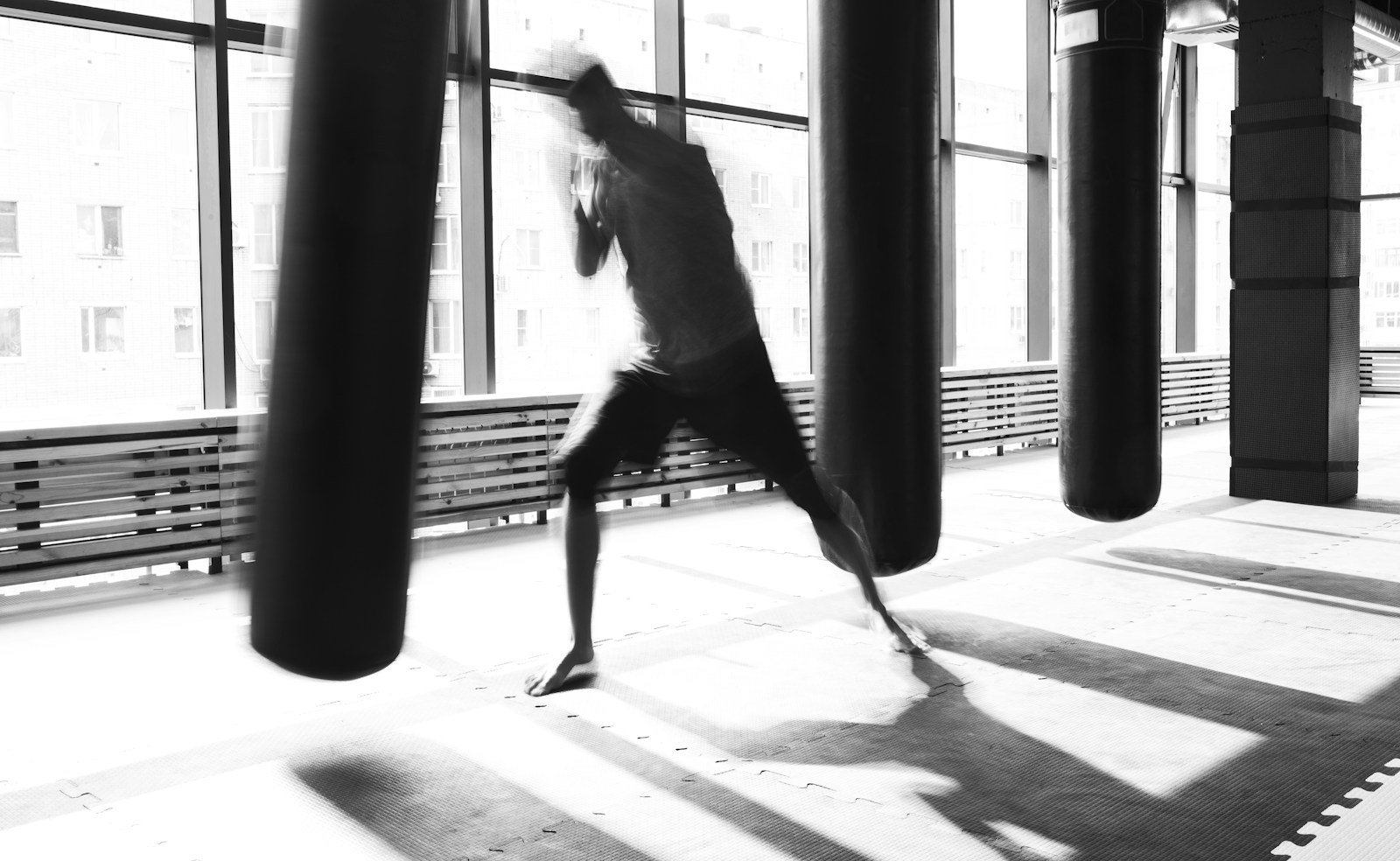 Heavy bags by the windows of the training floor