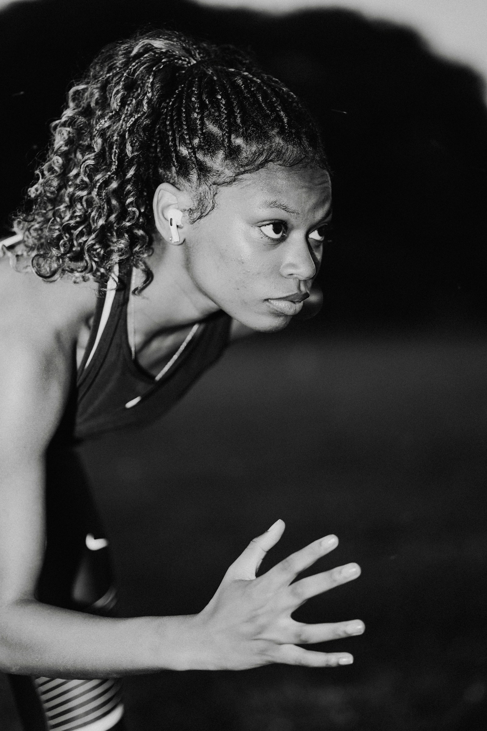 Sprinter in a set position, looking ahead